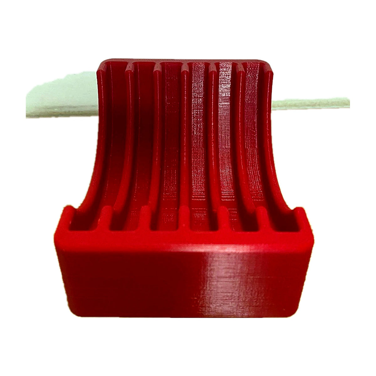 Empty red shell plate rack, front view