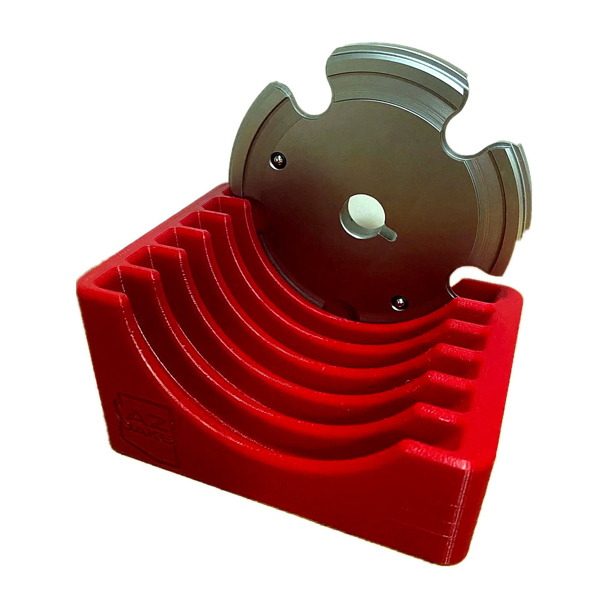Red benchtop rack with a shell plate in the rear slot