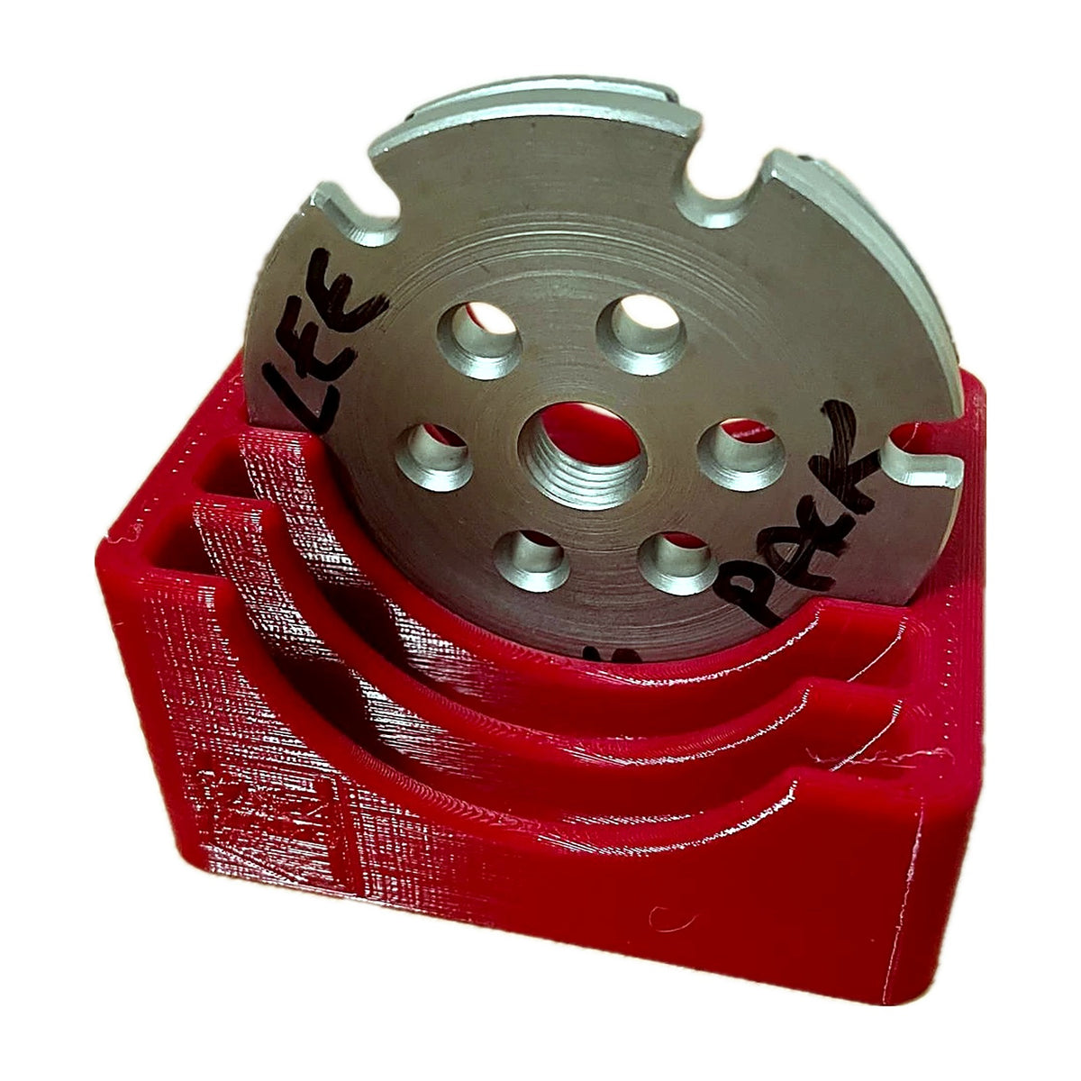 Stack of LEE Six Pack Pro shell plates seated in the red rack